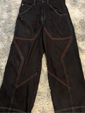Men's Relaxed Black Jeans with custom stitched patch always up to negotiate